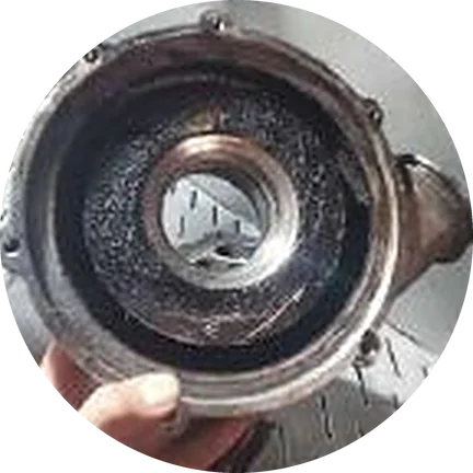 Before cleaning: the part with carbon and oil deposits